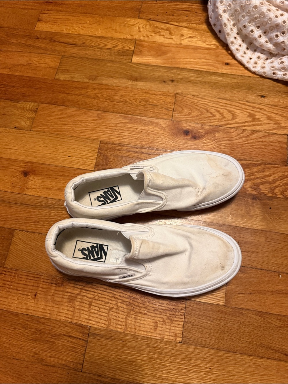 Vans Women’s Slip-On Canvas Sneakers in White